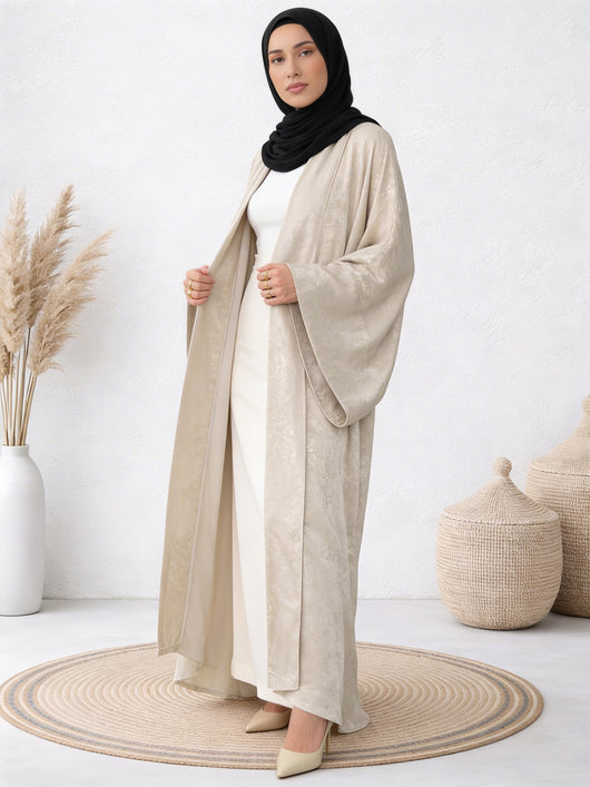 Woman wearing Safiya ayla abaya with graceful flow and refined outer layering