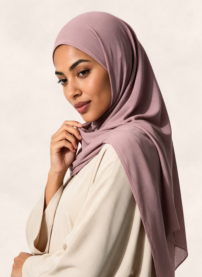 Close-up of woman wearing Nasma Instant Airy Jersey Hijab in Mauve dusty pink shade