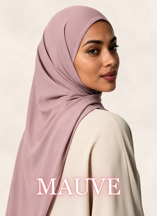 Woman wearing Nasma Instant Airy Jersey Hijab in Mauve dusty pink shade, side profile view, with shade name overlay