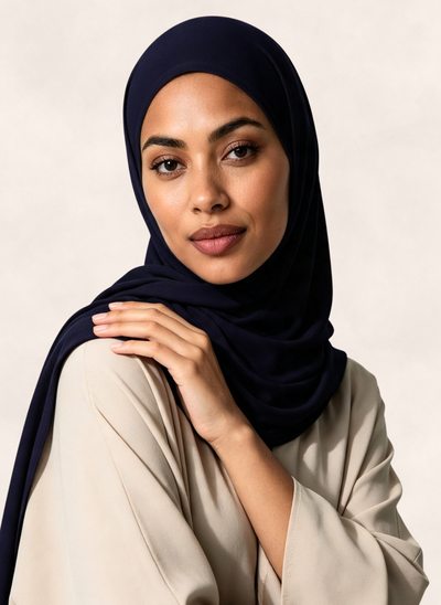 Close-up of woman wearing Nasma Instant Airy Jersey Hijab in Midnight navy shade
