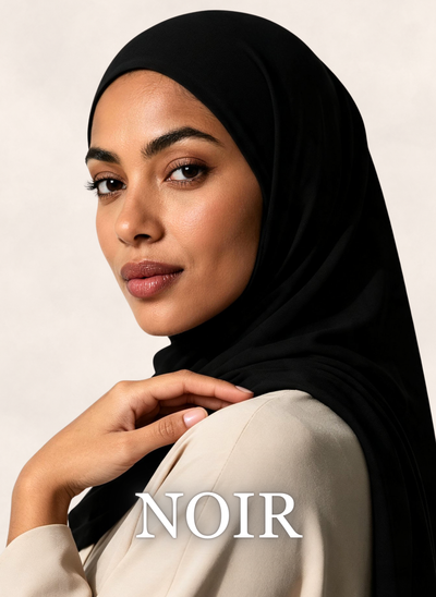 Woman wearing Nasma Instant Airy Jersey Hijab in Noir black shade, side profile view, with shade name overlay