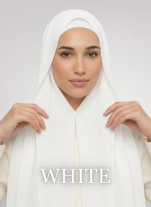 a hijabi wearing flowy instant chiffon hijab. in white color showcasing the magnet and soft fabric against white studio background
