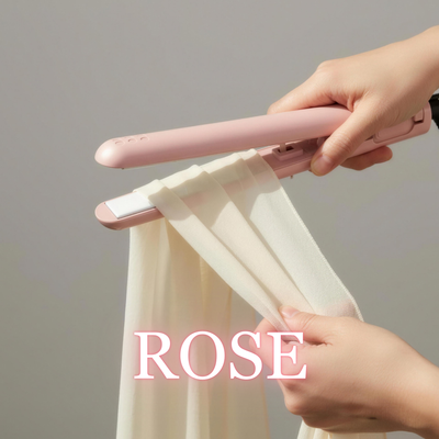 Rose pink NurAmira™ Hijab Straightener smoothing chiffon fabric on soft neutral background