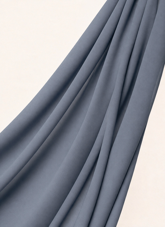Close-up of NurAmira Instant Chiffon Hijab fabric texture in Fjord slate-gray shade, soft draped folds.