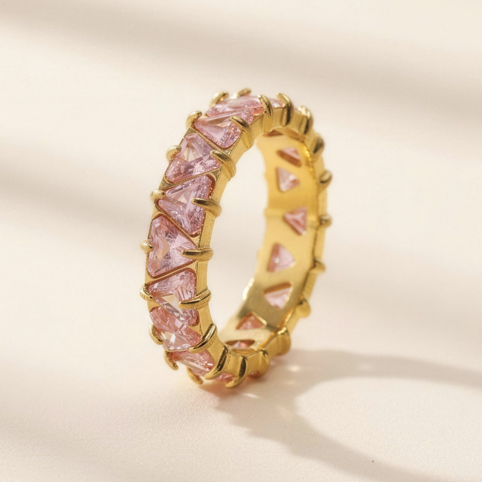 Soraya crystal ring in petal on neutral surface with soft lighting