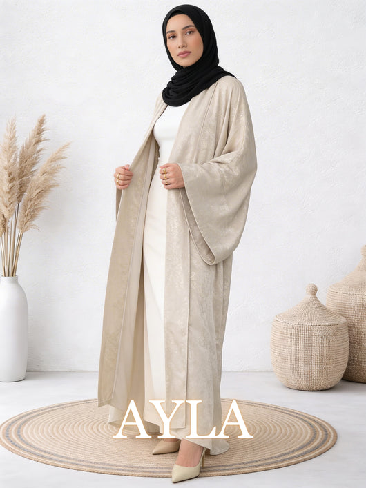 Woman wearing Safiya ayla abaya with elegant movement and relaxed layered design