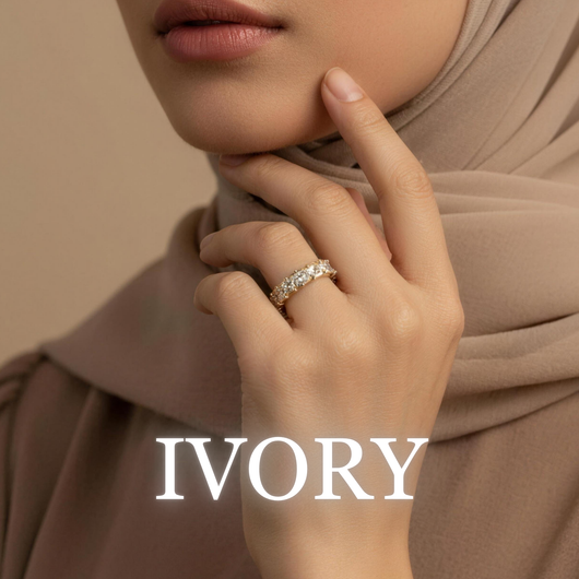 Woman wearing Soraya crystal ring in ivory with soft neutral hijab