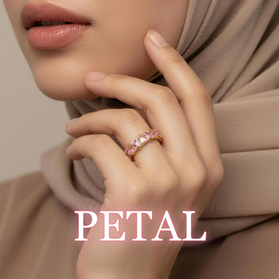 Woman wearing Soraya crystal ring in petal with warm beige tones
