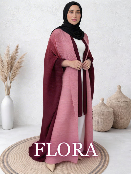 Woman wearing Sultana flora abaya with dual-tone drape and soft textured flow