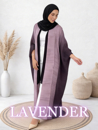Woman wearing Sultana lavender abaya with soft layering and effortless fit