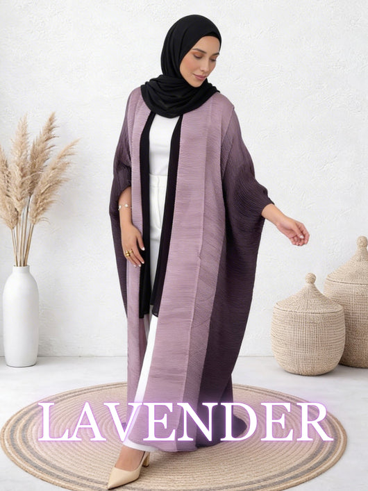 Woman wearing Sultana lavender abaya with soft layering and effortless fit