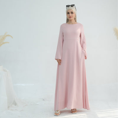 Linen abaya in pink worn by model