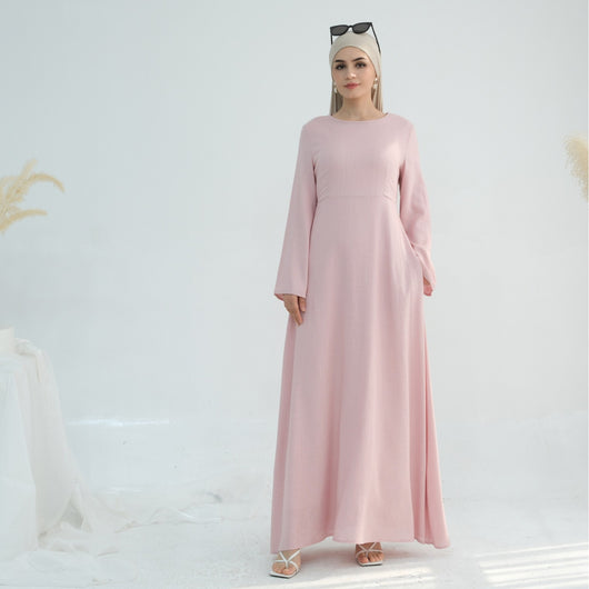 Linen abaya in pink worn by model