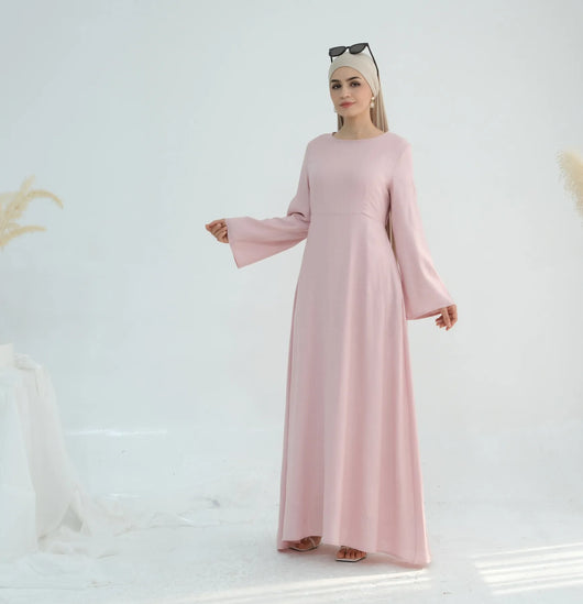 Linen abaya in pink worn from right side angle